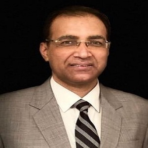 Dr. Anuj Mittal